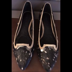 Hair-on black and white leather flats